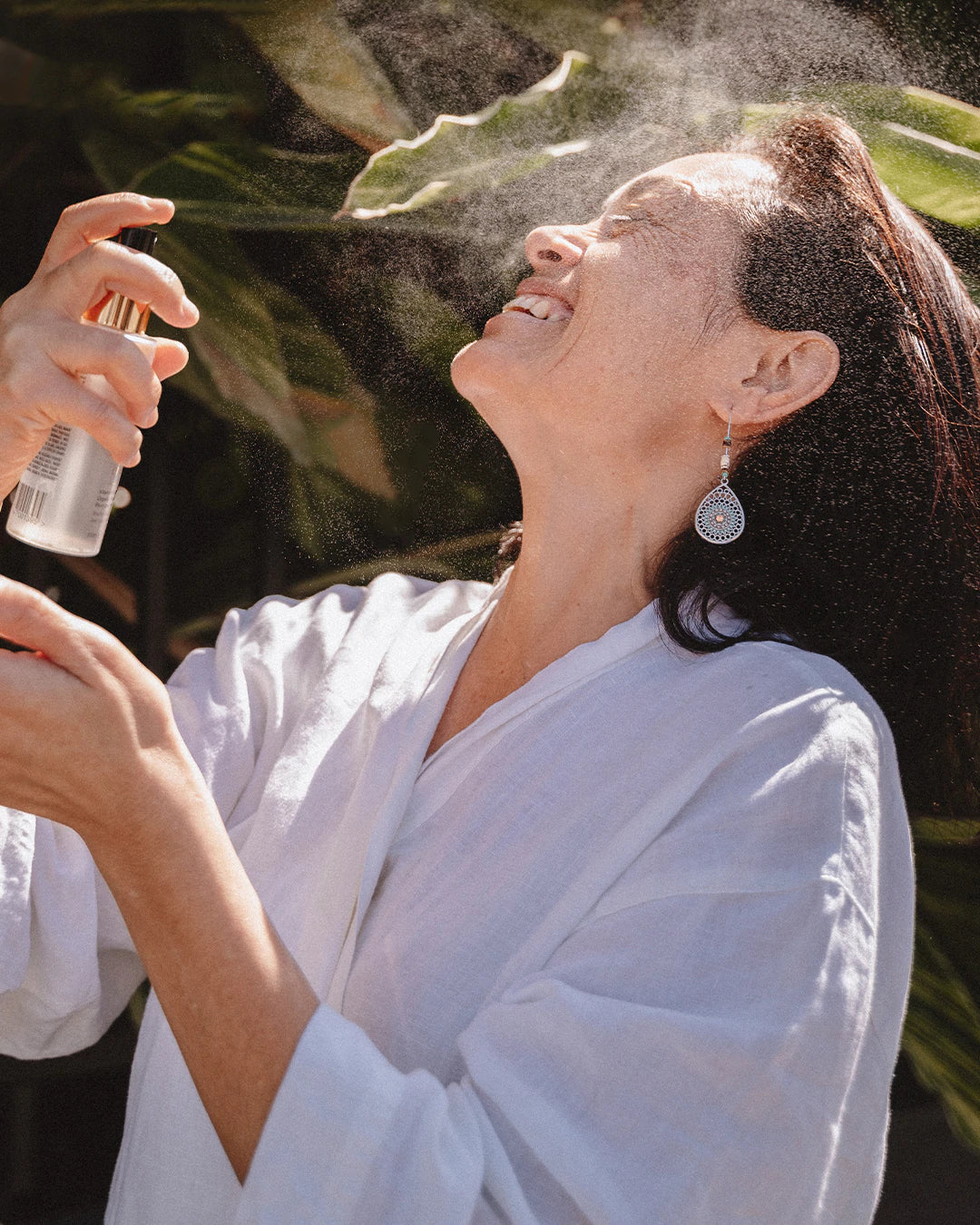 EBSD_SuperFruitToner_Spraying_Kally_Portrait_5c6b3ea5-2e7b-48a6-841f-a7f70b4c2486_1080x